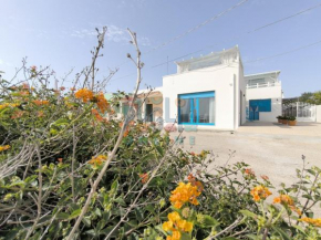 Monolocale Blue House fronte mare Puglia On line